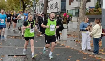 Green image with paw prints showing the IGDB logo and the words Official Event