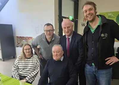 Bernard and family pictured with IGD's Chris Bennett and Senator Victor Boyhan