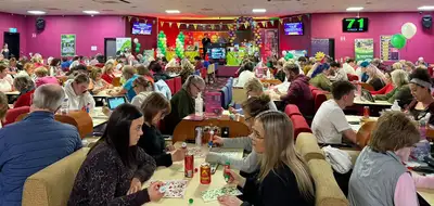 Photos of bingo players at the bingo night