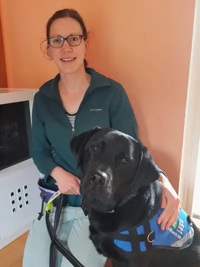 Zoe sitting with Walter beside her