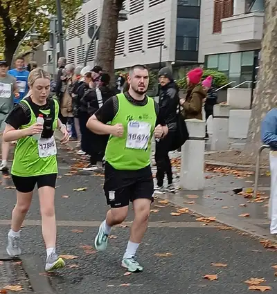 Green image with paw prints showing the IGDB logo and the words Official Event
