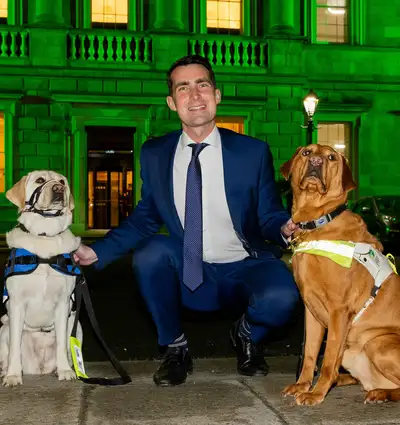 Leinster House Lit Up Green to Mark Irish Guide Dogs’ 50th Anniversary